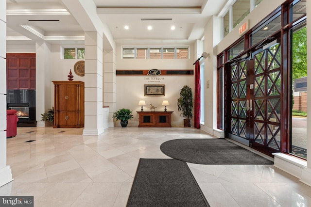 9480 Virginia Center Blvd Unit 327, Vienna, VA 22181 - building lobby featuring a towering ceiling, crown molding, and recessed lighting