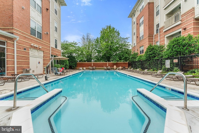 9480 Virginia Center Blvd Unit 327, Vienna, VA 22181 - community pool with a patio