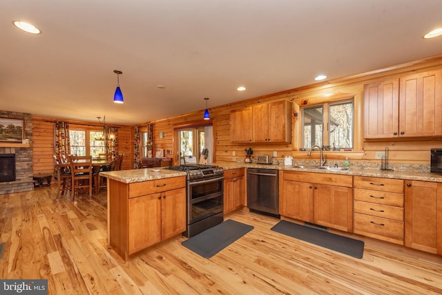 45 Marble Way, Mc Henry, MD 21541 - kitchen with stainless steel appliances, a peninsula, healthy amount of natural light, light wood-type flooring, and recessed lighting
