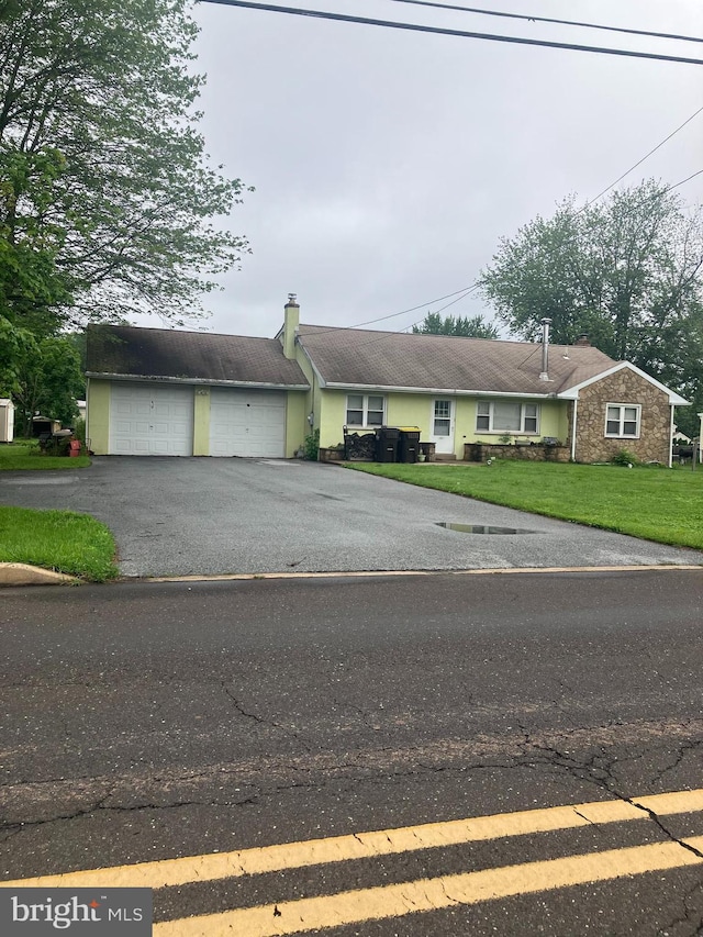 1336 Moyer Rd, Hatfield, PA 19440 - ranch-style house featuring driveway, a garage, a front yard, and a chimney