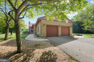 114 Lloyd Guessford Rd, Townsend, DE 19734 - view of home's exterior with driveway and a garage