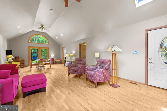 114 Lloyd Guessford Rd, Townsend, DE 19734 - living area featuring ceiling fan, wood finished floors, and vaulted ceiling