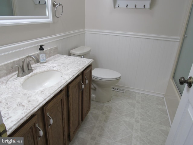 3590 Choptank Rd, Preston, MD 21655 - full bath with vanity, a wainscoted wall, combined bath / shower with glass door, and tile patterned flooring