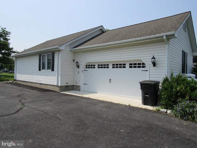 3590 Choptank Rd, Preston, MD 21655 - view of home's exterior featuring a garage, roof with shingles, and asphalt driveway