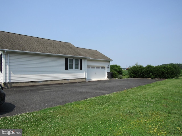 3590 Choptank Rd, Preston, MD 21655 - view of home's exterior featuring a garage, driveway, a yard, crawl space, and roof with shingles