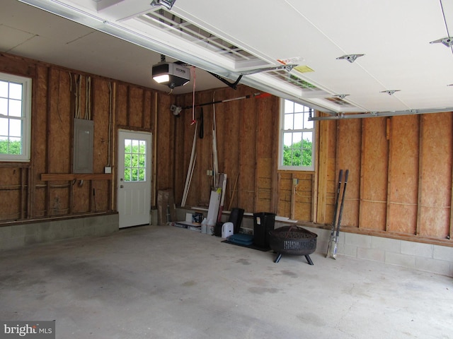 3590 Choptank Rd, Preston, MD 21655 - garage featuring a garage door opener and electric panel