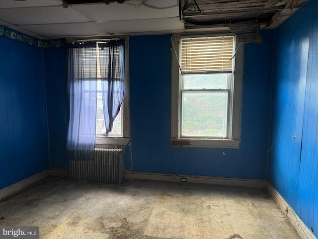 1031 N Ashburton St, Baltimore, MD 21216 - carpeted empty room with radiator and baseboards