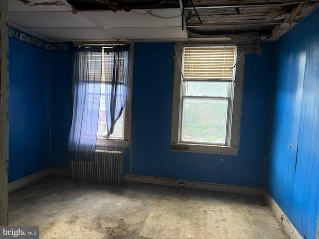 1031 N Ashburton St, Baltimore, MD 21216 - carpeted spare room featuring radiator and baseboards