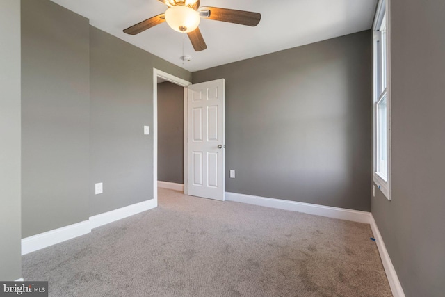 1955 N Collington Ave, Baltimore, MD 21213 - carpeted spare room with a ceiling fan and baseboards