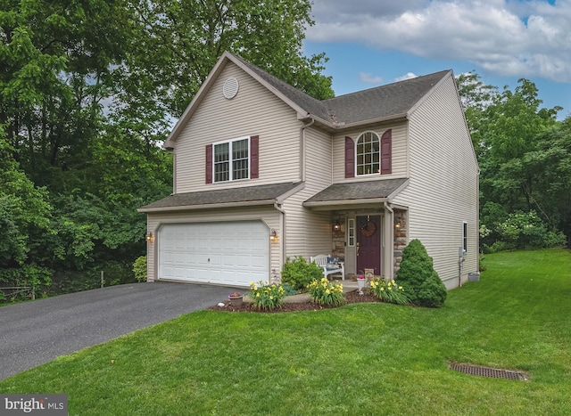 1905 Reading Blvd, Reading, PA 19609 - traditional-style home featuring a garage, asphalt driveway, a front lawn, stone siding, and roof with shingles