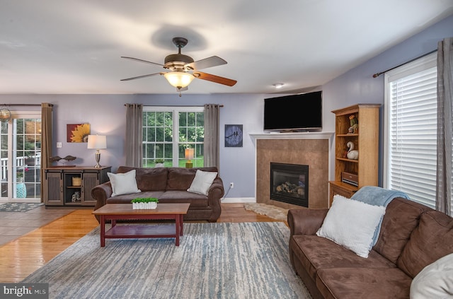 1905 Reading Blvd, Reading, PA 19609 - living area featuring a fireplace, wood finished floors, and a ceiling fan