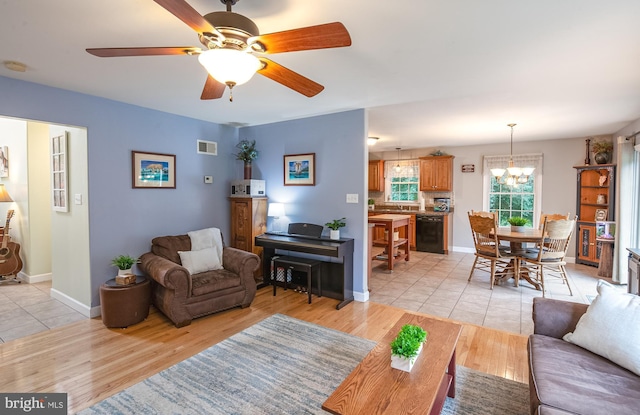 1905 Reading Blvd, Reading, PA 19609 - living area featuring a chandelier, light wood-type flooring, and ceiling fan