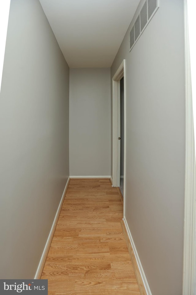 11 Bryce Ct, Baltimore, MD 21236 - corridor featuring light wood finished floors and baseboards