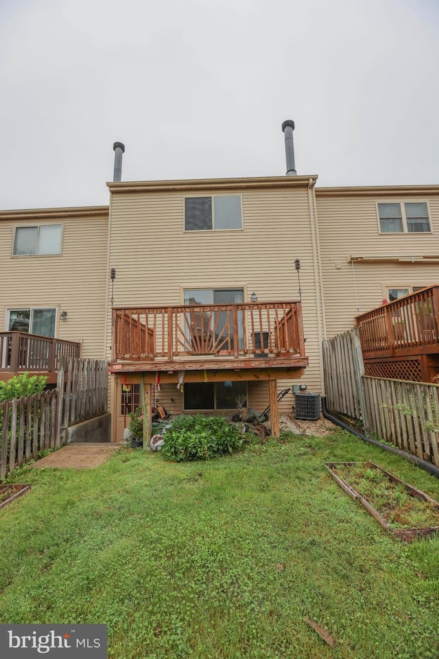 11 Bryce Ct, Baltimore, MD 21236 - rear view of house featuring a fenced backyard and a wooden deck