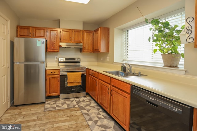 11 Bryce Ct, Baltimore, MD 21236 - kitchen featuring appliances with stainless steel finishes, under cabinet range hood, light countertops, and plenty of natural light