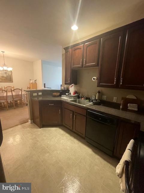 103 Raphael Ct, Williamstown, NJ 08094 - kitchen with dishwasher, a peninsula, dark brown cabinets, a chandelier, and stove