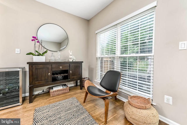 1246 Vintage Pl, Reston, VA 20194 - living area featuring beverage cooler and wood finished floors