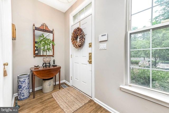 1246 Vintage Pl, Reston, VA 20194 - entrance foyer with baseboards and light wood-type flooring