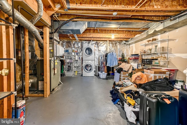 1246 Vintage Pl, Reston, VA 20194 - unfinished basement featuring stacked washer / drying machine