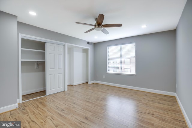 9704 Kingsbridge Dr Unit 203, Fairfax, VA 22031 - unfurnished bedroom featuring light wood finished floors and ceiling fan
