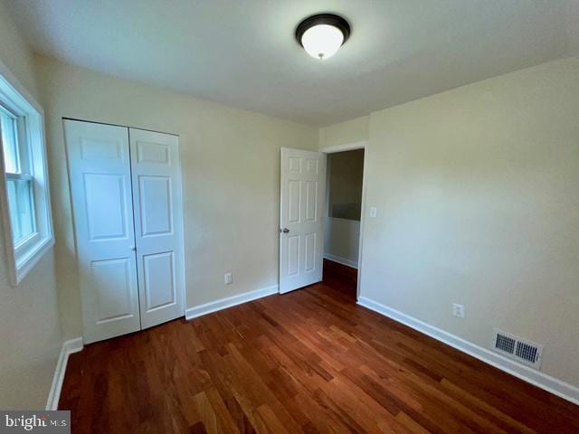 2301 Wyngate Rd, Suitland, MD 20746 - unfurnished bedroom with wood finished floors and a closet