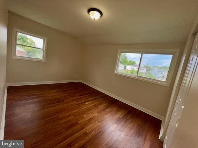 2301 Wyngate Rd, Suitland, MD 20746 - empty room featuring dark wood-type flooring and plenty of natural light