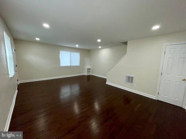 2301 Wyngate Rd, Suitland, MD 20746 - unfurnished living room with recessed lighting and wood finished floors