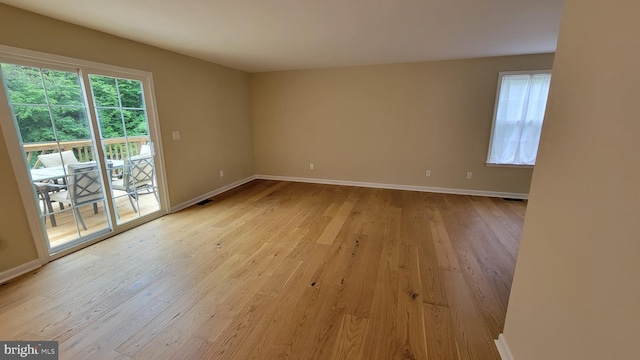 112 Pine Crest Ln, Gordonsville, VA 22942 - empty room with healthy amount of natural light and light wood finished floors