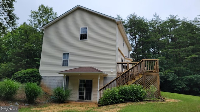 112 Pine Crest Ln, Gordonsville, VA 22942 - rear view of house featuring stairs, a deck, and a yard