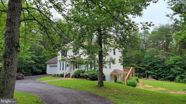 112 Pine Crest Ln, Gordonsville, VA 22942 - view of front of property featuring a front yard, asphalt driveway, and a garage