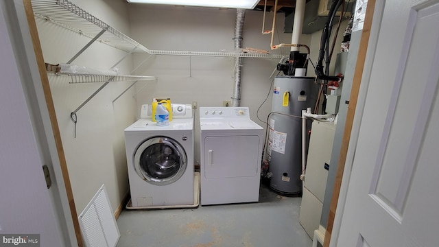 112 Pine Crest Ln, Gordonsville, VA 22942 - laundry area with gas water heater and washing machine and dryer