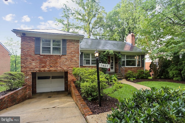 1407 Crestridge Dr, Silver Spring, MD 20910 - tri-level home with concrete driveway, brick siding, a garage, and a chimney