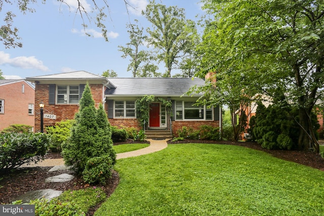 1407 Crestridge Dr, Silver Spring, MD 20910 - view of front facade with brick siding, a front yard, and a chimney