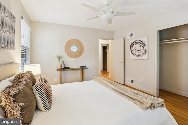 1407 Crestridge Dr, Silver Spring, MD 20910 - bedroom featuring wood finished floors, a closet, and a ceiling fan
