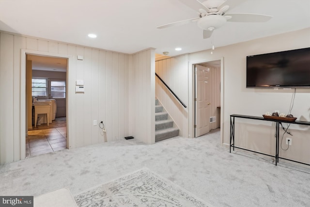 1407 Crestridge Dr, Silver Spring, MD 20910 - unfurnished living room featuring stairs, carpet floors, a ceiling fan, and recessed lighting