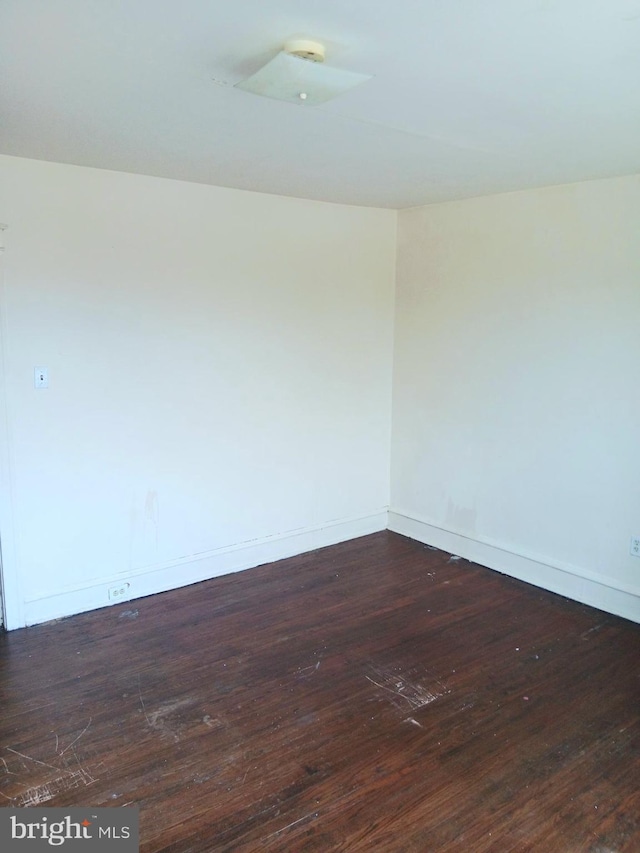 201 N 7th St, Darby, PA 19023 - empty room with hardwood / wood-style floors and baseboards