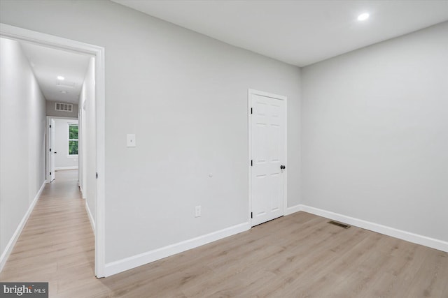 1635 Montpelier St, Baltimore, MD 21218 - empty room with light wood-style floors and recessed lighting