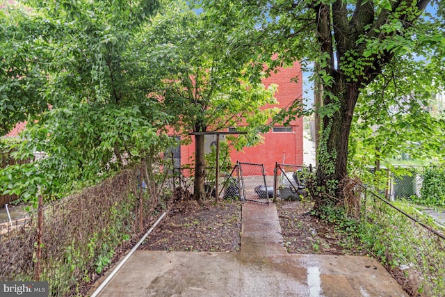 1635 Montpelier St, Baltimore, MD 21218 - view of yard featuring a gate