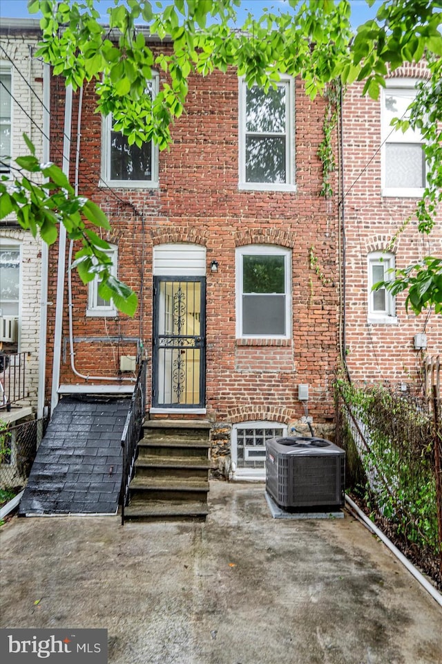 1635 Montpelier St, Baltimore, MD 21218 - view of front of property with entry steps and brick siding