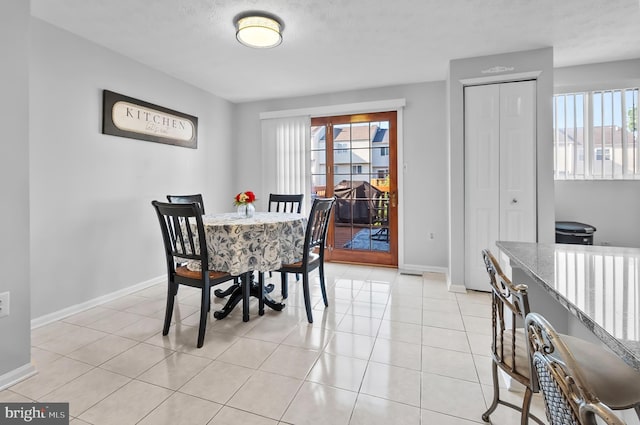 9258 Pirates Cv, Columbia, MD 21046 - dining area featuring plenty of natural light and light tile patterned flooring