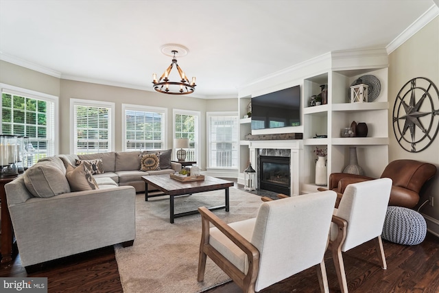 20481 Tappahannock Pl, Sterling, VA 20165 - living room with ornamental molding, a chandelier, wood finished floors, and a premium fireplace