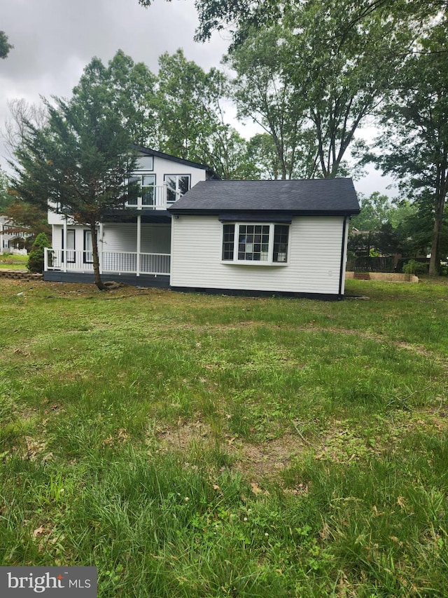2421 Highland Rd, Williamstown, NJ 08094 - view of front of home featuring a balcony and a front yard