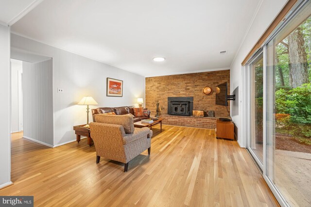 8306 Winslow Ave, Springfield, VA 22152 - living room with light wood-type flooring and crown molding
