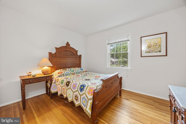 8306 Winslow Ave, Springfield, VA 22152 - bedroom featuring light wood finished floors and baseboards
