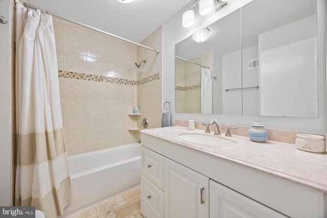 8306 Winslow Ave, Springfield, VA 22152 - bathroom with shower / bath combo with shower curtain and vanity