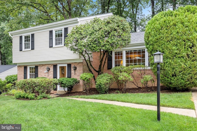 8306 Winslow Ave, Springfield, VA 22152 - view of front of property with a front lawn and brick siding