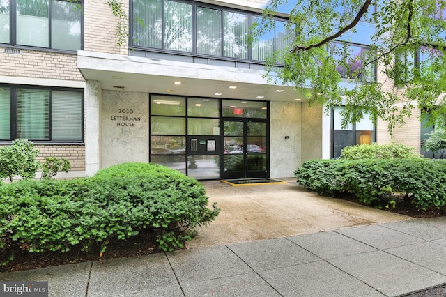 2030 F St NW Unit 111, Washington, DC 20006 - property entrance featuring brick siding and stucco siding