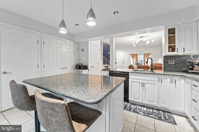 3436 Caledonia Cir, Woodbridge, VA 22192 - kitchen featuring dishwasher, light tile patterned flooring, white cabinetry, a kitchen island, and recessed lighting