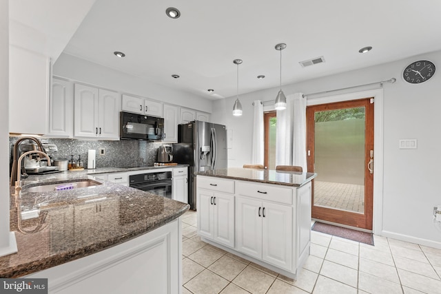 3436 Caledonia Cir, Woodbridge, VA 22192 - kitchen with black appliances, tasteful backsplash, dark stone countertops, white cabinets, and recessed lighting