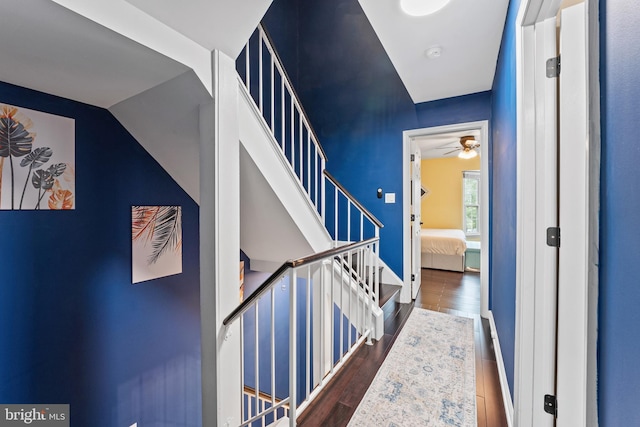3436 Caledonia Cir, Woodbridge, VA 22192 - hallway featuring dark wood-style flooring and stairs